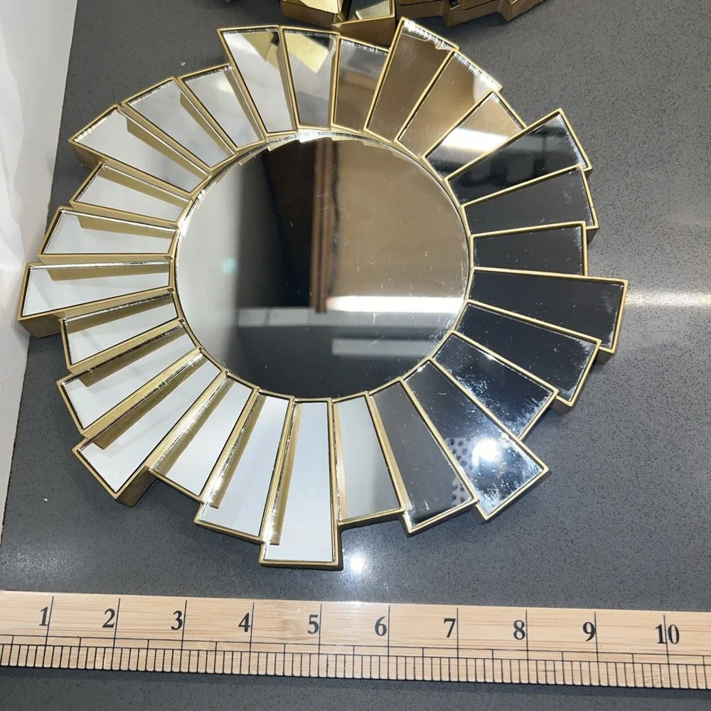 Three Gold Style Plastic Sunburst Wall Hanging Accent Mirrors.